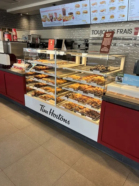 Tim Hortons storefront and interior at 5556 Boul Ste-anne, Boischatel, QC