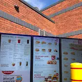 Tim Hortons storefront and interior at 1560 Boul De Montarville, Boucherville, QC