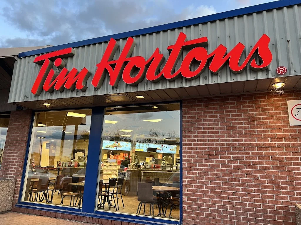 Tim Hortons storefront and interior at 1155 Boul Rome, Brossard, QC