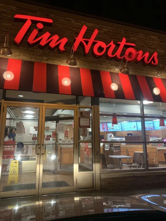 Tim Hortons storefront and interior at 2141, Boul. Lapiniere, Brossard, QC