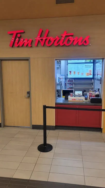 Tim Hortons storefront and interior at 6975 Philippine Street, Brossard, QC
