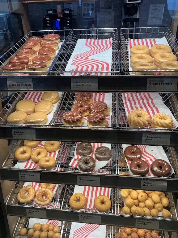 Tim Hortons storefront and interior at 8700, Boul. Leduc, Suite 10, Brossard, QC