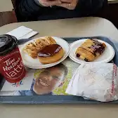 Tim Hortons storefront and interior at 8700, Boul. Leduc, Suite 10, Brossard, QC