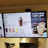 Tim Hortons storefront and interior at 400 Rue Strasbourg, Candiac, QC