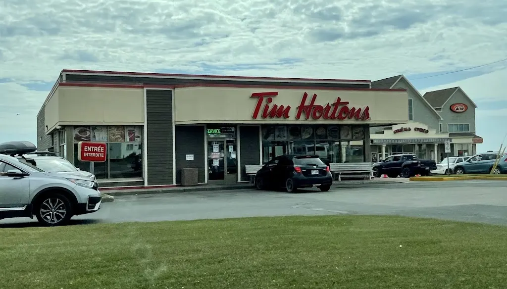 Tim Hortons storefront and interior at 368 Chemin Principal, Cap-aux-meules, QC