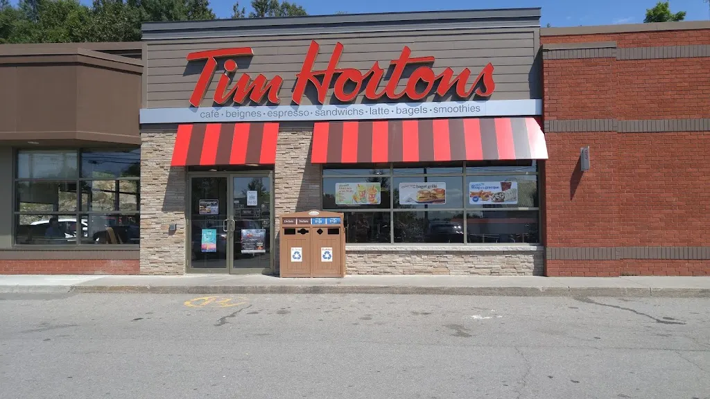 Tim Hortons storefront and interior at 1050, Ste-genevieve, Chicoutimi, QC