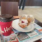 Tim Hortons storefront and interior at 1050, Ste-genevieve, Chicoutimi, QC