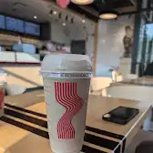 Tim Hortons storefront and interior at 200 Boul. Primeau, Châteauguay, QC