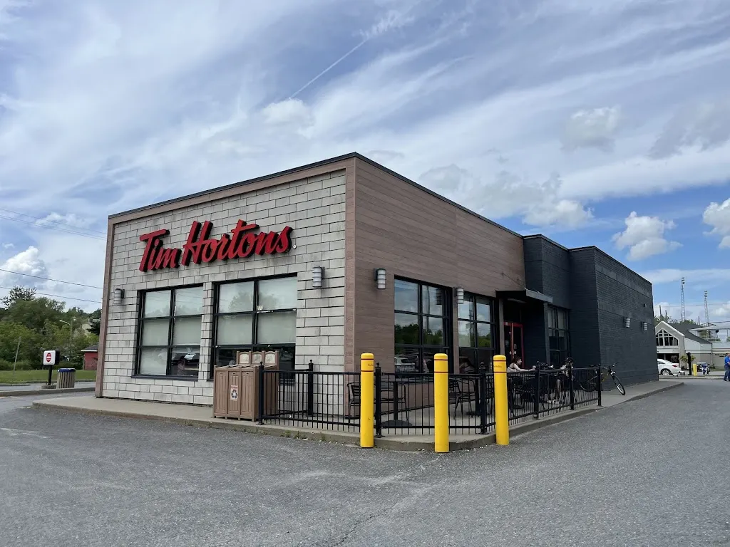 Tim Hortons storefront and interior at 237 Rue Main Est, Coaticook, QC