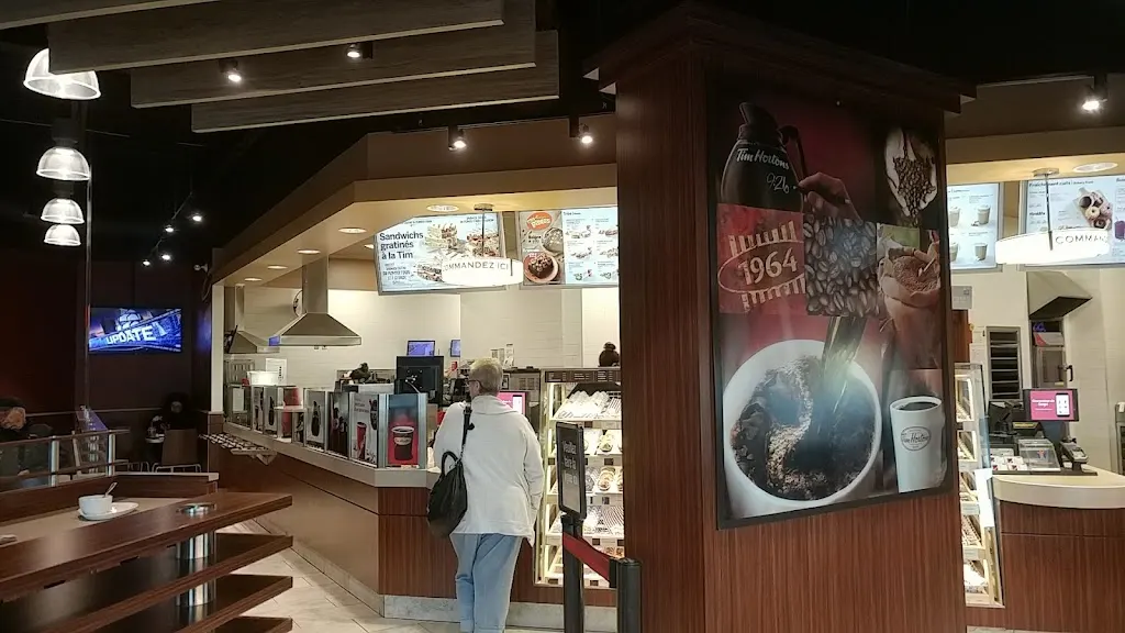 Tim Hortons storefront and interior at 4950 Rue Des Patriotes, Contrecoeur, QC