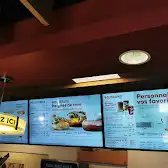 Tim Hortons storefront and interior at 61 Route 201, Coteau Du Lac, QC