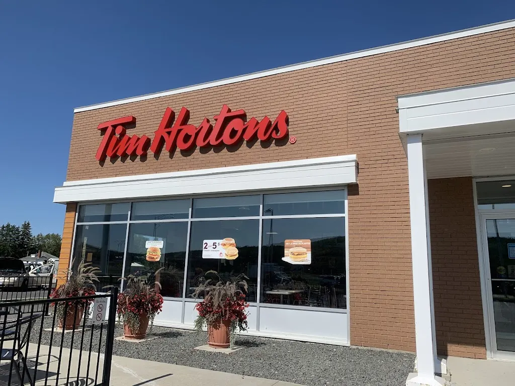 Tim Hortons storefront and interior at 1169 Ave De L'accueil, Degelis, QC