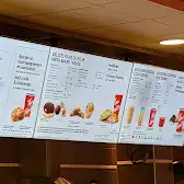 Tim Hortons storefront and interior at 975 Boul Roméo Vachon Nord, Dorval, QC