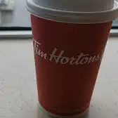 Tim Hortons storefront and interior at 975 Boul Roméo Vachon Nord, Dorval, QC