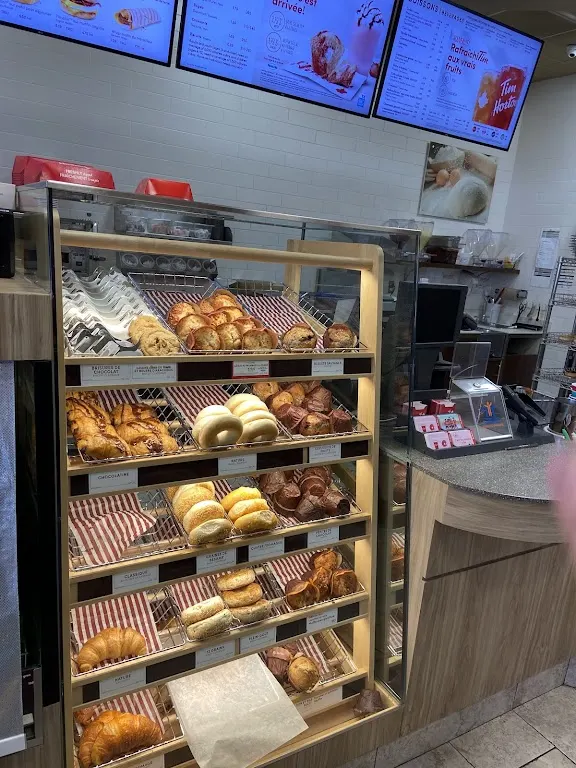 Tim Hortons storefront and interior at 181, Route 138 Ouest, Forestville, QC