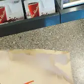 Tim Hortons storefront and interior at 46 Boulevard Greber, Gatineau, QC