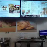 Tim Hortons storefront and interior at 415, Boul. De La Verendrye Est, Gatineau, QC