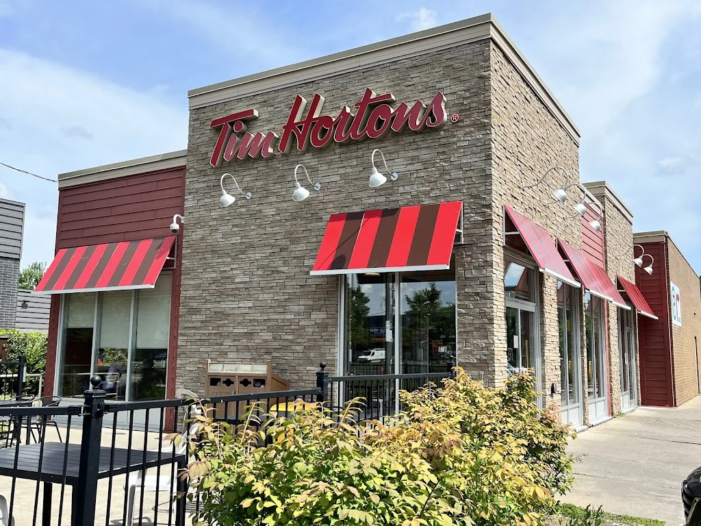 Tim Hortons storefront and interior at 3319 Boul Taschereau, Greenfield Park, QC