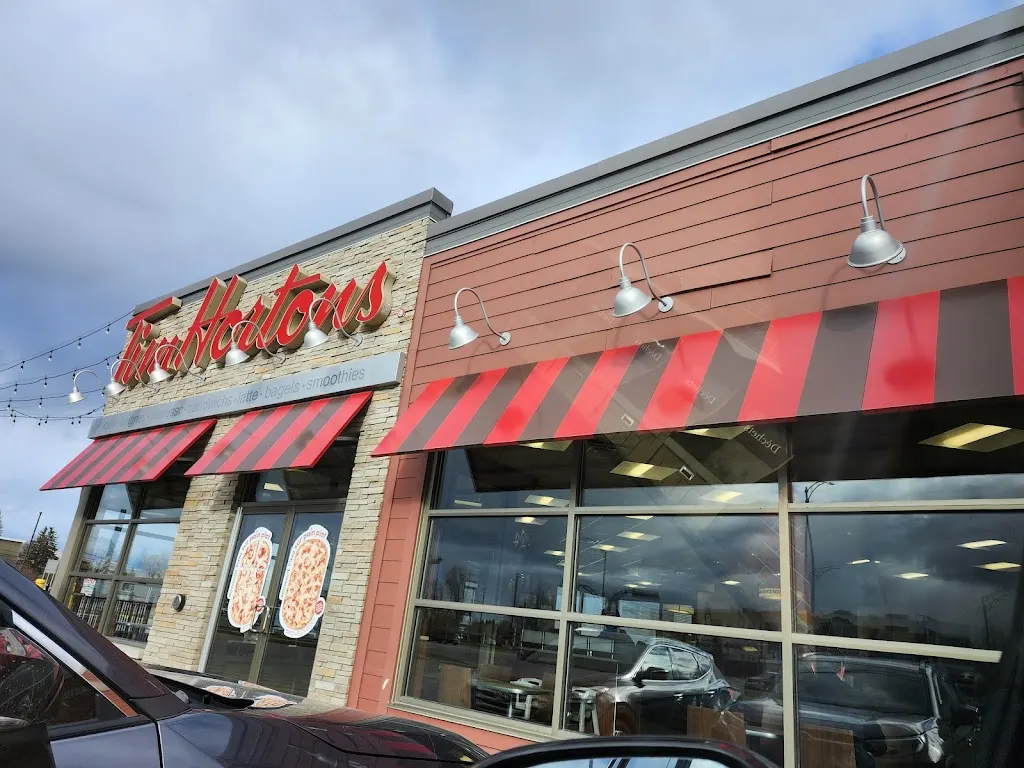 Tim Hortons storefront and interior at 2667 Boul Du Royaume, Jonquiere, QC