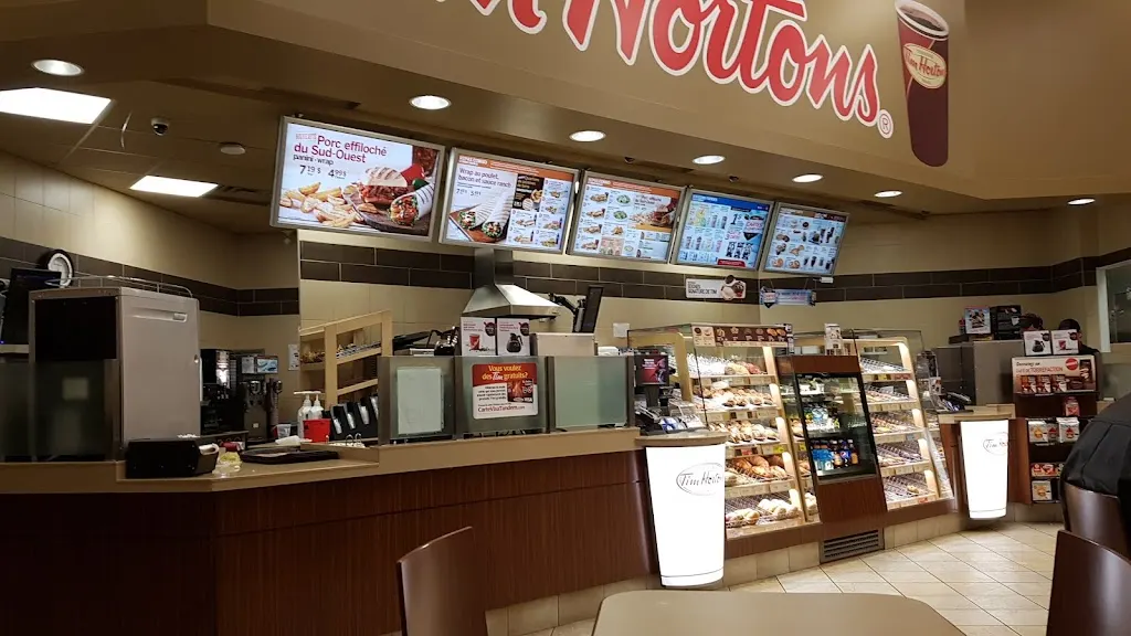 Tim Hortons storefront and interior at 3820 Boul. Harvey, Jonquiere, QC