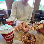Tim Hortons storefront and interior at 3895 Rue Des Mouettes, Jonquiere, QC