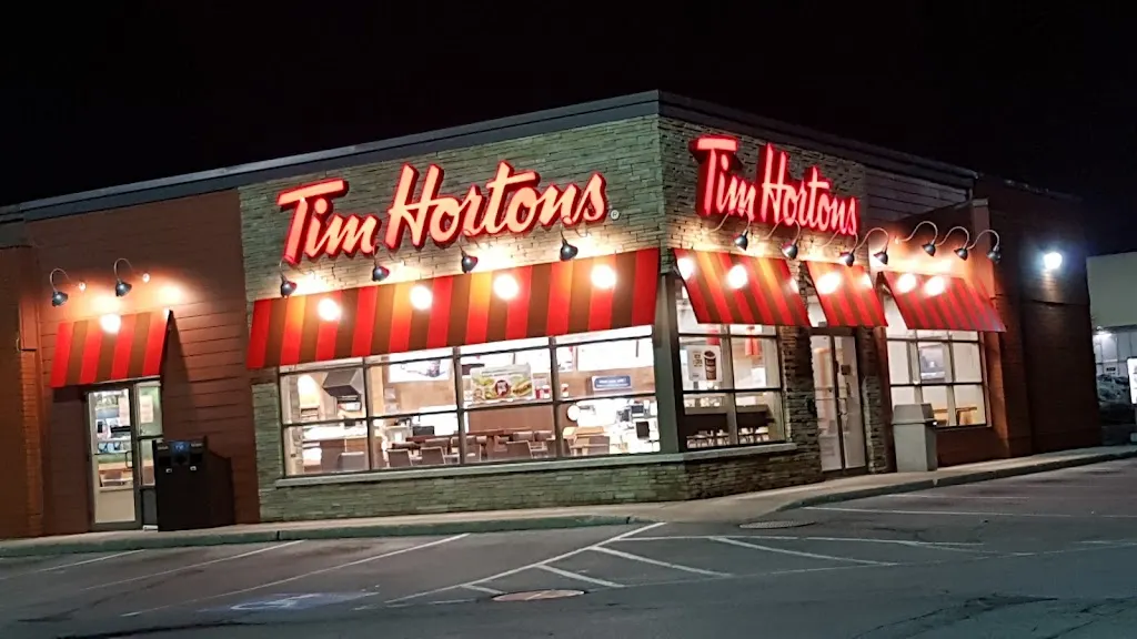 Tim Hortons storefront and interior at 3140 Rue Jean-yves, Kirkland, QC