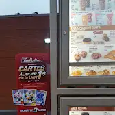 Tim Hortons storefront and interior at 3140 Rue Jean-yves, Kirkland, QC