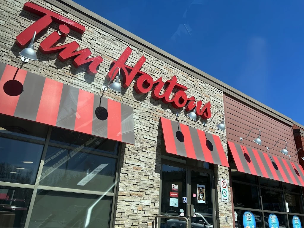 Tim Hortons storefront and interior at 221 Av Industrielle, La Pocatiere, QC