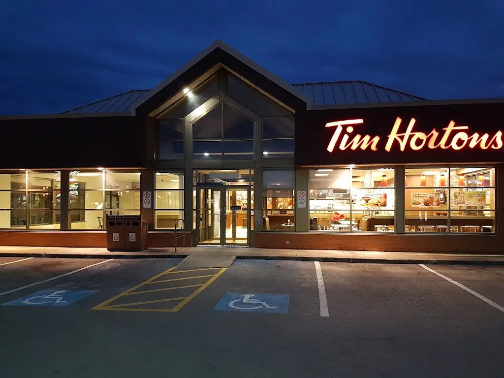 Tim Hortons storefront and interior at 400, Montee Des Pionniers, Lachenaie, QC