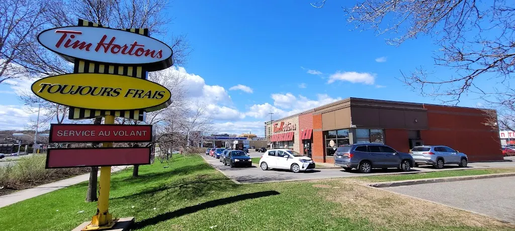 Tim Hortons storefront and interior at 1225 Autoroute Duplessis, L'ancienne-lorette, QC