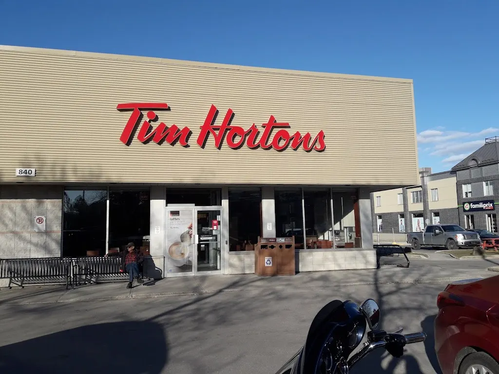Tim Hortons storefront and interior at 840, Boul. L'ange-gardien Nord, L'assomption, QC