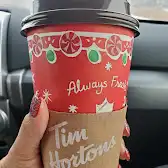 Tim Hortons storefront and interior at 128 Boul Laurier, Laurier-station, QC
