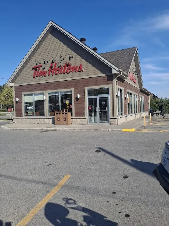 Tim Hortons storefront and interior at 489 Boul Des Laurentides, Laval, QC