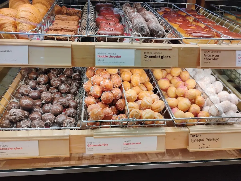 Tim Hortons storefront and interior at 1664 Boul Des Laurentides, Laval, QC