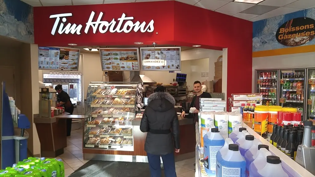 Tim Hortons storefront and interior at 2025, Boul. Arthur-sauve, Laval, QC