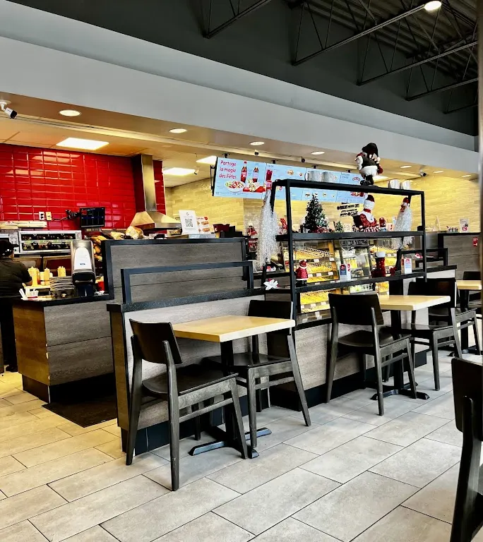 Tim Hortons storefront and interior at 2305 Boul Industriel, Laval, QC