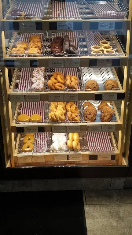 Tim Hortons storefront and interior at 2910 Rue Etienne-lenoir, Laval, QC