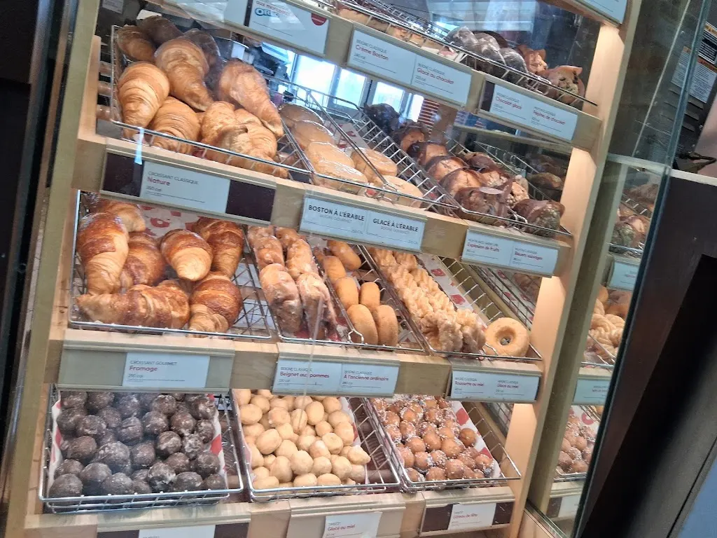 Tim Hortons storefront and interior at 3265 Boul St Martin, Laval, QC