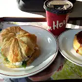 Tim Hortons storefront and interior at 5700 Boul Des Laurentides, Laval, QC