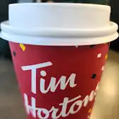 Tim Hortons storefront and interior at 104 Boul Don-quichotte, L'ile-perrot, QC