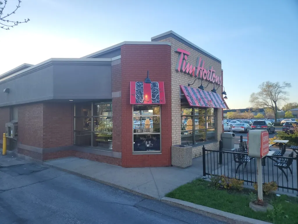 Tim Hortons storefront and interior at 895 Rue St Laurent Ouest, Longueuil, QC