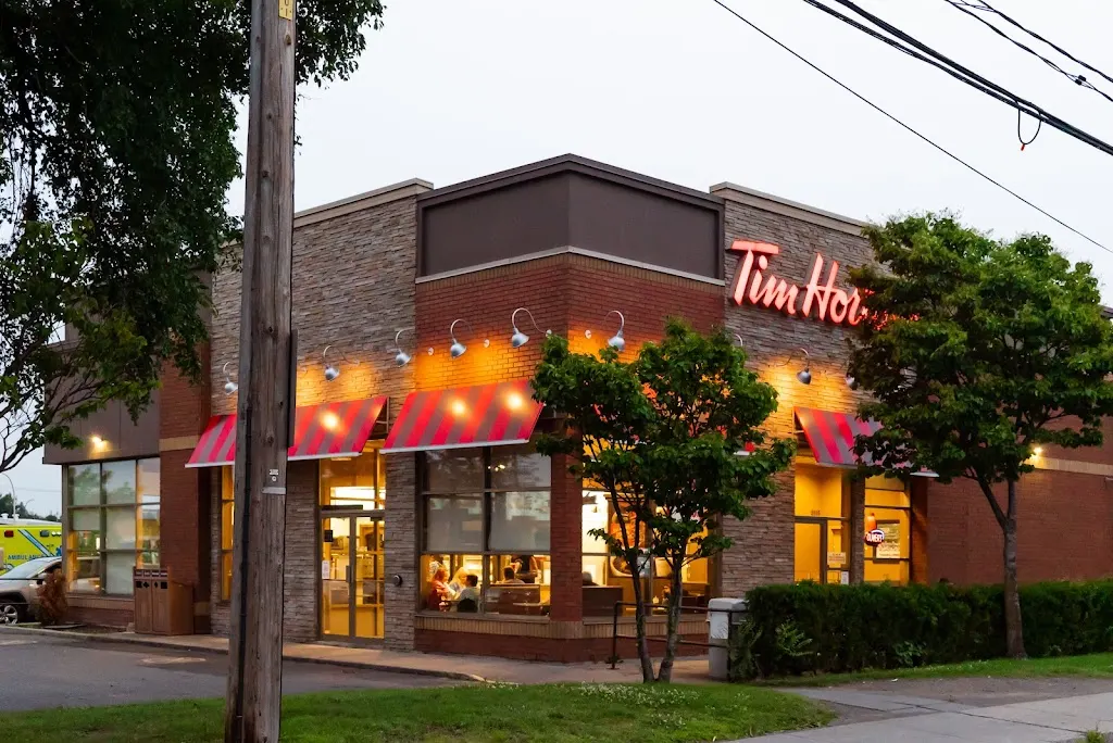 Tim Hortons storefront and interior at 2695 Ch De Chambly, Longueuil, QC