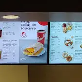 Tim Hortons storefront and interior at 2836 Chemin Chambly, Longueuil, QC