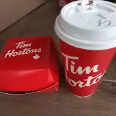 Tim Hortons storefront and interior at 7, Rue Des Erables, Metabetchouan-lac-a-la-croix, QC