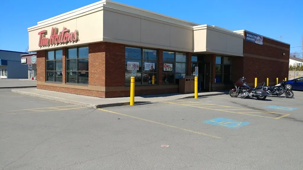 Tim Hortons storefront and interior at 13935 Rue St Simon, Mirabel, QC
