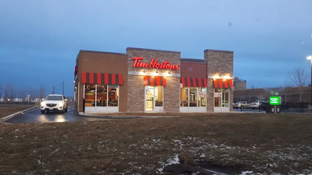Tim Hortons storefront and interior at 9900 Sherboork E  Mtl, Montreal-est, QC
