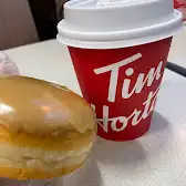 Tim Hortons storefront and interior at 93 Rue St Catherine Ouest, Montreal, QC