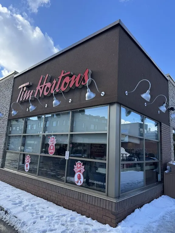 Tim Hortons storefront and interior at 323 Rue Jean-talon Est, Montreal, QC
