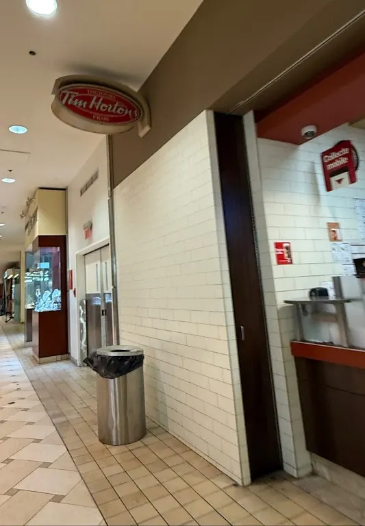 Tim Hortons storefront and interior at 625 Rue Ste-catherine Ouest, Montreal, QC