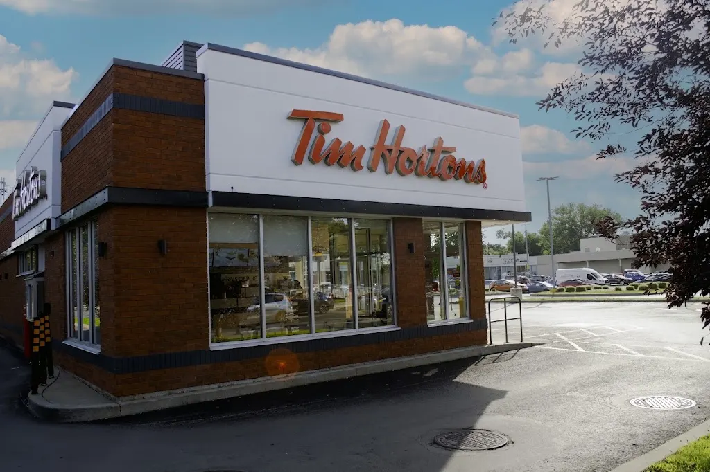 Tim Hortons storefront and interior at 1220 Boul St Jean-baptiste, Montreal, QC